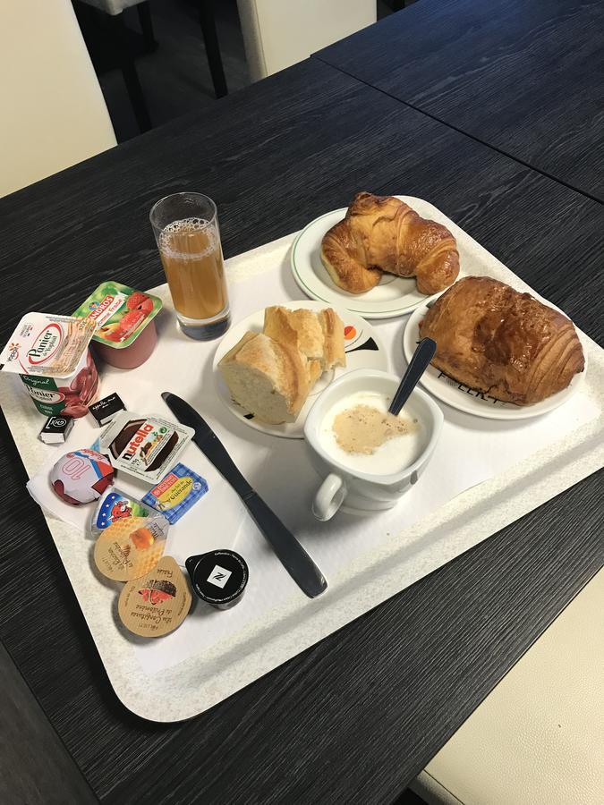 罗湖酒店 Séné 外观 照片